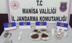 Manisa'da evinde 1 kilo uyuşturucu ve yüzlerce hapla yakalandı